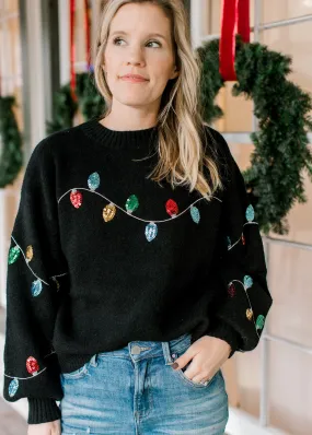 Sure! Here’s an optimized title for the e-commerce product:

Cozy X-Mas Lights Holiday Sweater - Festive, Colorful, and Perfect for Christmas Celebrations

Feel free to adjust any specific details as necessary!